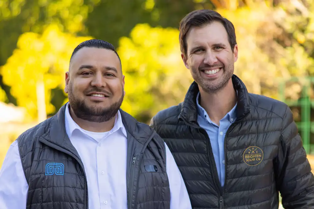 Two male Montecito Bank and Trust associates smiling ahead.