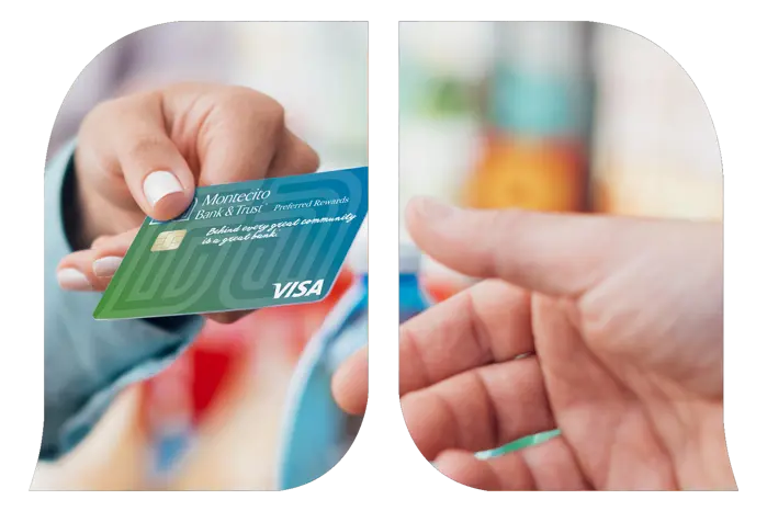 A hand holding Montecito Bank and Trust preferred rewards credit card passing it to another hand.