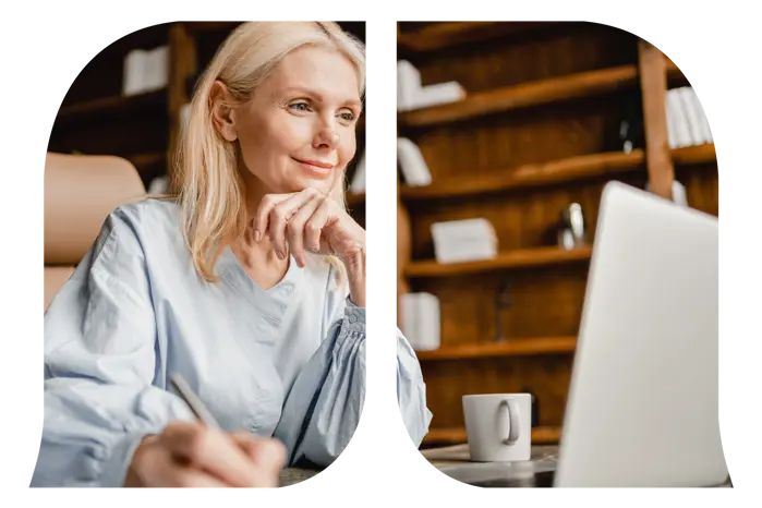 A woman looking at her laptop.